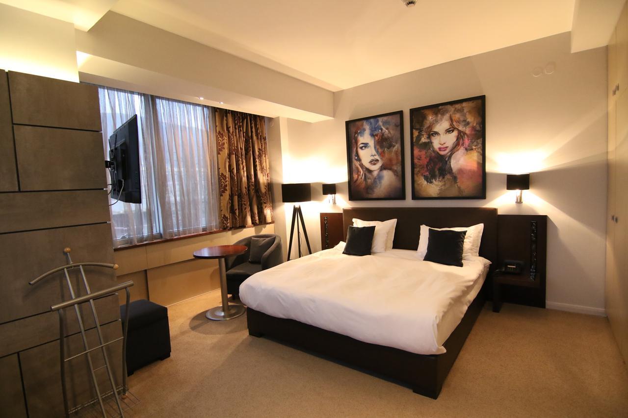 Queen'S Hotel - Zebra Centre سكوبجي الغرفة الصورة